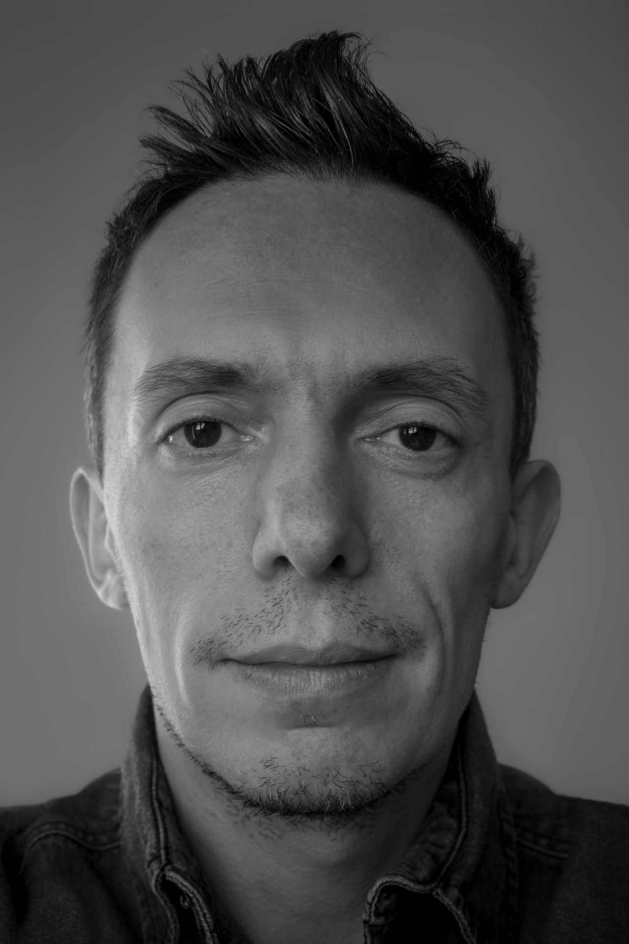 A portrait photo of Umberto Diecinove.